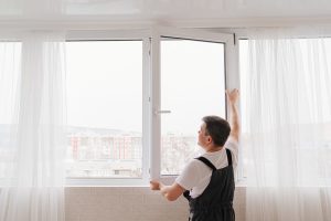 Double-glazed-window-being-fitted-300x200.jpg