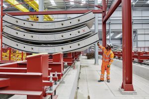 HS2-Engineer-inspects-pre-cast-concrete-tunnel-segment-at-Chiltern-Tunnel-onsite-factory-in-Hertfordshire-300x200.jpg