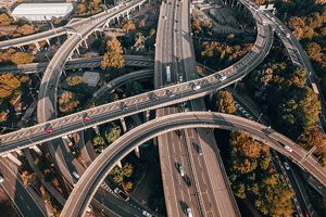 Vehicles in the UK Driving on a Spaghetti Junction Interchange in the Autumn